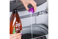 Image Pourring laundry detergent.